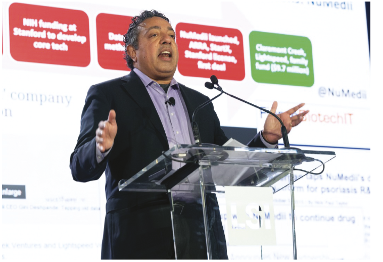 Atul Butte on stage at LSI USA 2023.