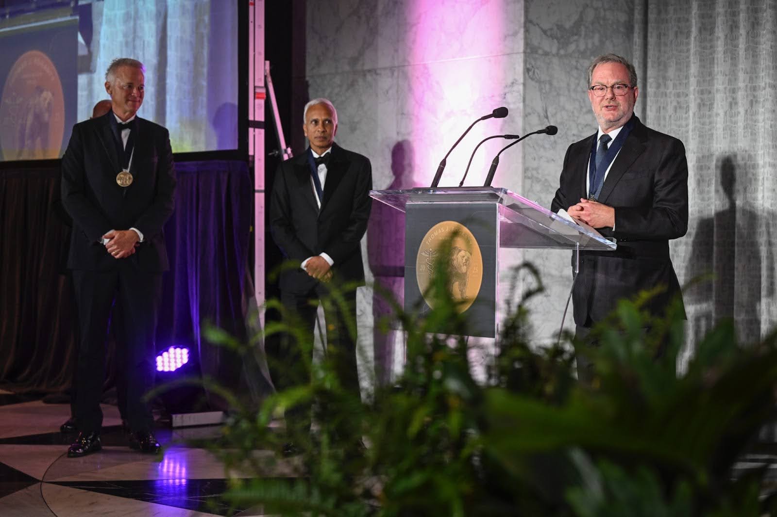 Allan Zingeler (right), Raju Viswanathan, PhD (center), and Michael Mahoney (left) onstage at the inaugural Thomas J. Fogarty Innovation Prize Gala